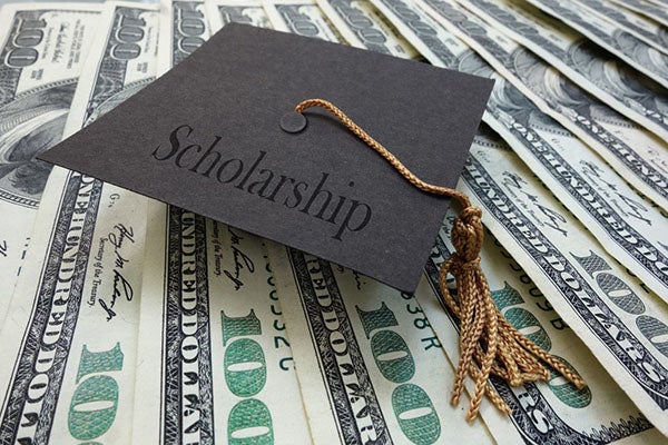 scholarships clipart with grad hat